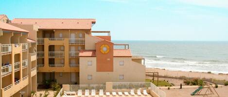 Sky, Water, Cloud, Plant, Building, Window, Swimming Pool, Azure, House, Seaside Resort