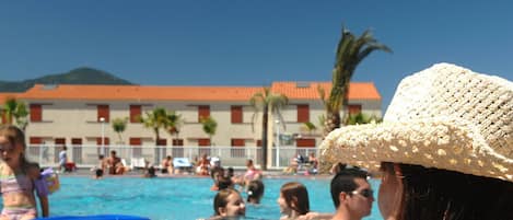 Water, Sky, Swimming Pool, Body Of Water, Umbrella, Building, Leisure