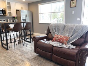 Enjoy the loveseat with a blanket/pillow.  Both sides individually recline, too!