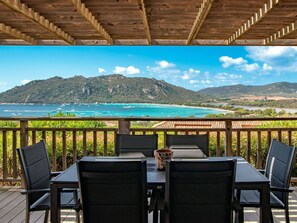 Sky, Furniture, Property, Cloud, Mountain, Water, Plant, Table, Nature, Chair