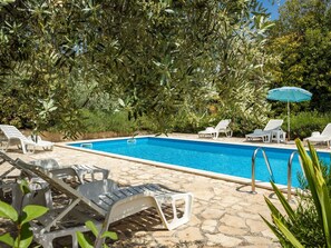 Water, Plant, Furniture, Property, Swimming Pool, Chair, Shade, Outdoor Furniture, Tree, Rectangle