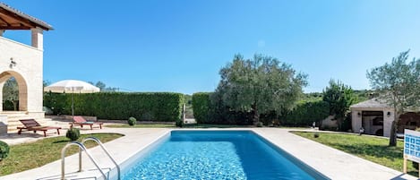 Water, Sky, Plant, Azure, Swimming Pool, Shade, Rectangle, Grass, Tree, Residential Area