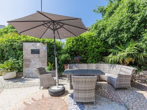 Plant, Property, Sky, Shade, Flowerpot, Outdoor Furniture, House, Tree, Table, Public Space
