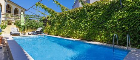 Water, Plant, Property, Sky, Building, Blue, Swimming Pool, Azure, Shade, Window