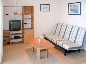 Table, Furniture, Couch, Picture Frame, Property, Comfort, Wood, Living Room, Building, Interior Design