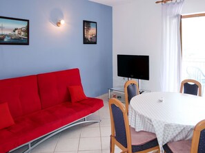 Room, Property, Furniture, Red, Building, Interior Design, Living Room, Table, Floor, Wall