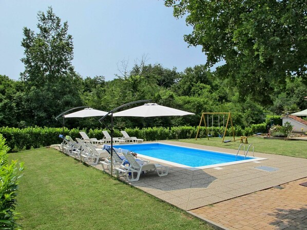 Plant, Umbrella, Sky, Shade, Outdoor Furniture, Swimming Pool, Tree, Water, Building, Chair