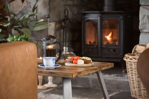 A light lunch in front of the fire. All firewood from our farm - free of  charge