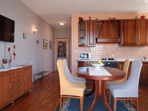 Furniture, Cabinetry, Property, Table, Chair, Picture Frame, Wood, Interior Design, Dresser, Flooring