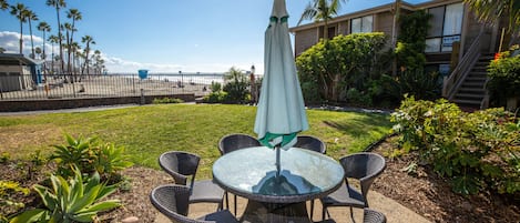 WOW! This is one of the prime locations at North Coast Village, with ocean and sand views straight down to the Oceanside Pier from your own patio and grassy yard!