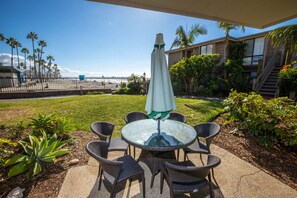 WOW! This is one of the prime locations at North Coast Village, with ocean and sand views straight down to the Oceanside Pier from your own patio and grassy yard!