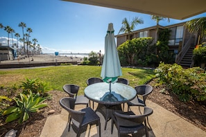 WOW! This is one of the prime locations at North Coast Village, with ocean and sand views straight down to the Oceanside Pier from your own patio and grassy yard!