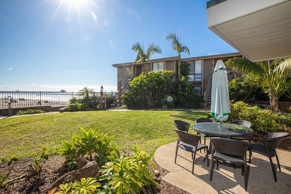 Enjoy watching sailboats and surfers from your patio and grassy yard.