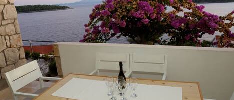 Table, Plant, Furniture, Property, Water, Flower, Sky, Flowerpot, Building, Window