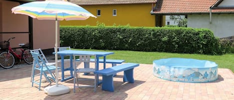 Property, Umbrella, Table, Patio, Building, Furniture, Outdoor Table, Shade, Swimming Pool, Real Estate