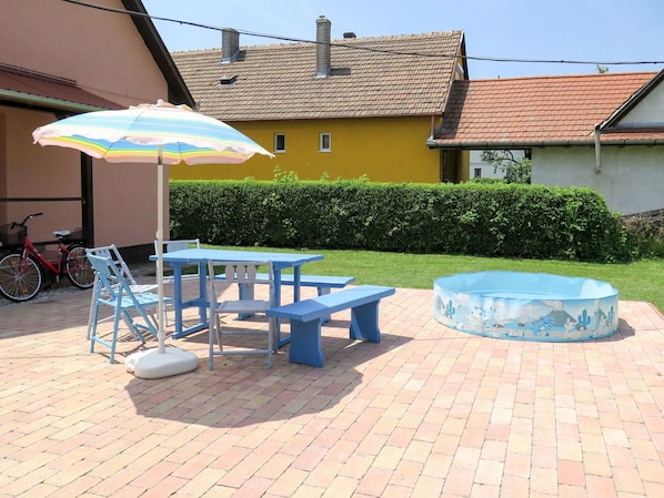 Property, Umbrella, Table, Patio, Building, Furniture, Outdoor Table, Shade, Swimming Pool, Real Estate