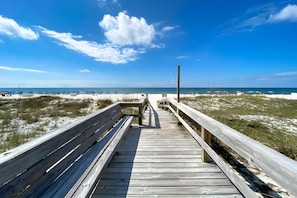 Boardwalk over the dunes to the powdery white sands of Orange Beach