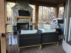 Beautiful sitting area overlooking the lake and wood  burning fireplace