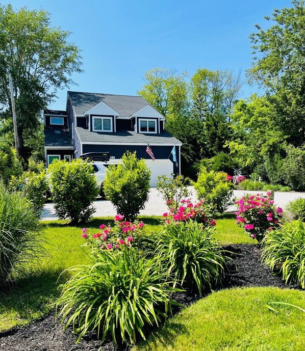 Inviting retreat set far back from the road; new landscaping!