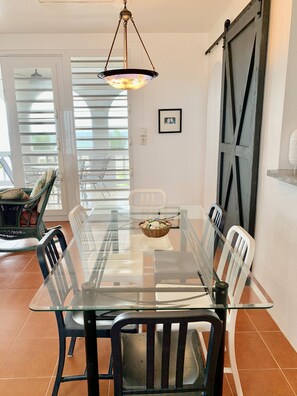 Spacious dining area comfortably seats 6