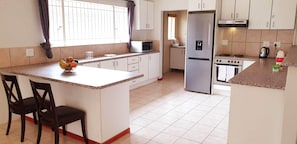 The spacious, fully fitted kitchen