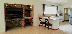 The Indoor Braai fireplace and breakfast bar