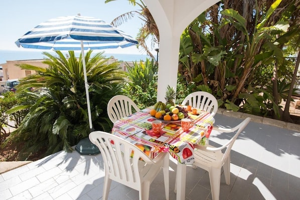 errace with table and chairs