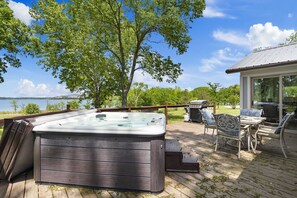 Soak in the private hot tub!
