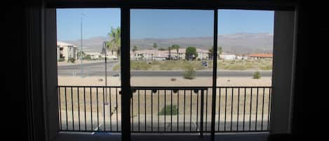 Sliding door to Balcony facing west. 