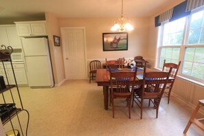View from the den into the eating area. 