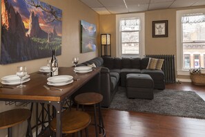 Eating area and living room. Fully equipped kitchenette with dishes