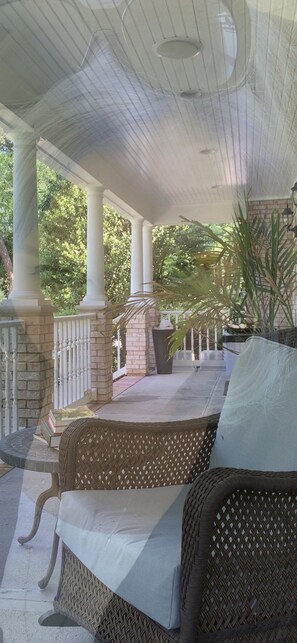 Spacious front  (w/porch ceiling fan) and back porch