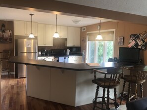 Big kitchen, lots of counter space and everything you could need!