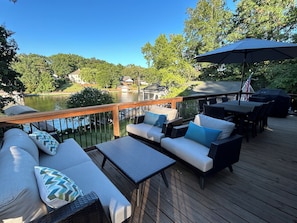 Deck overlooking water and sunrise