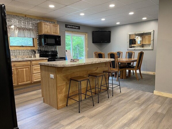 Dining area with TV that includes Netflix and Amazon subscriptions