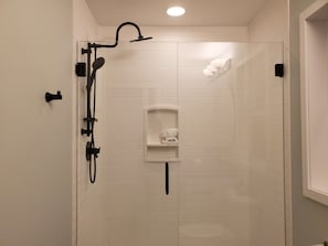 Upstairs bathroom with luxurious rain showerhead