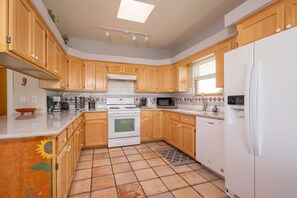 Well equipped chef’s kitchen with everything you need to cook or order in.