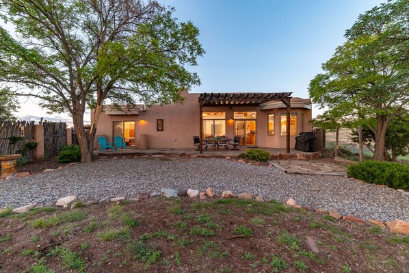 Generous, fenced-in and private, back yard. Furry family members love it.