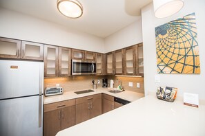 Curb your appetite by cooking a meal in your kitchen.