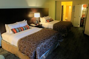 There are 3 Queen beds in this suite.