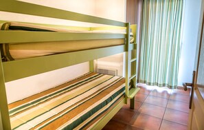 There is a sleeping alcove with Bunk beds.