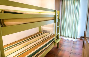 The third bedroom contains a bunk bed