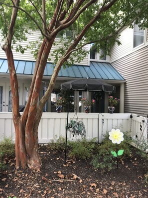 Our Front Patio With Umbrella Table And Four Chairs