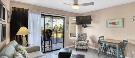 Seaside Villa 120 - Living room - The beautifully decorated living area has an Ocean view balcony.