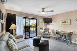 Seaside Villa 120 - Living room - The beautifully decorated living area has an Ocean view balcony.