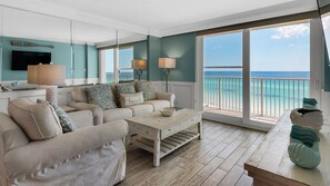 BeachCrest 604 Gulf Front Living room with private balcony and l