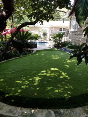 Putting green by pool