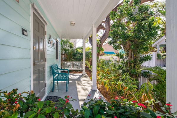 Feel the tropical vibe on this great front porch!