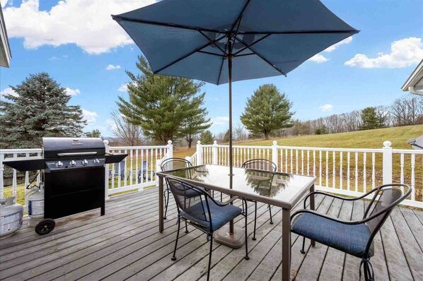 Enjoy the deck, grill, and huge backyard space. 