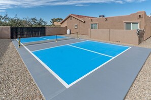 Newly added pickleball court with paddles. WOW!